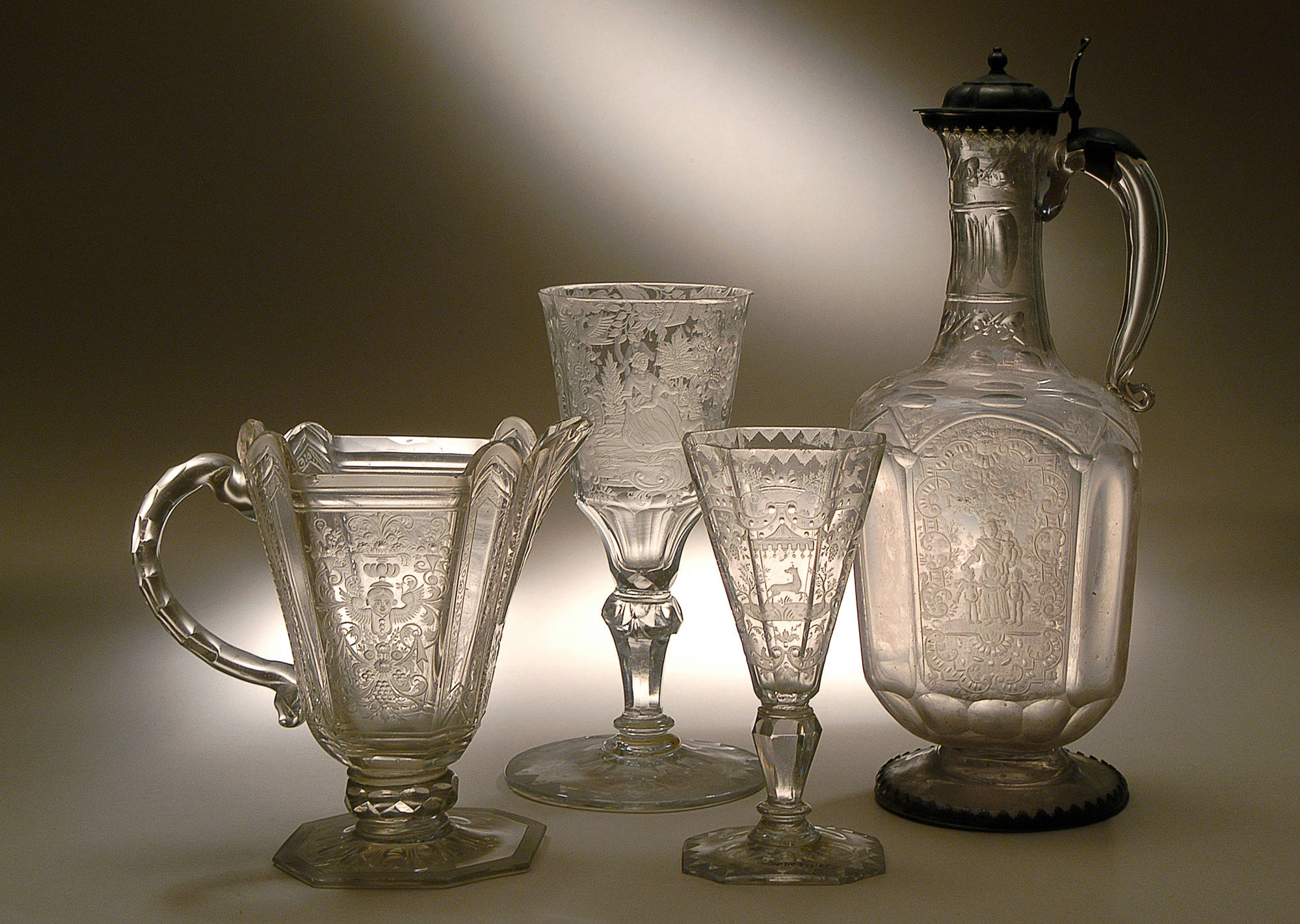 Drinking vessels with wheel engraved courting and allegorical scenes, Bohemia and Silesia, 18th century. Photo: Leonid Padrul