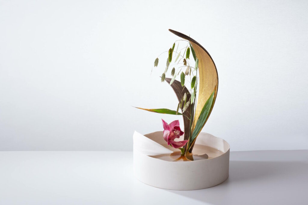 Mirit Weinstock, Never is a long time, 2024. Porcelain, dry palm, Wild oats, gold lacquer, brass, 24 Karat gold, orchid. Photo: Yoshiyuki  Sano