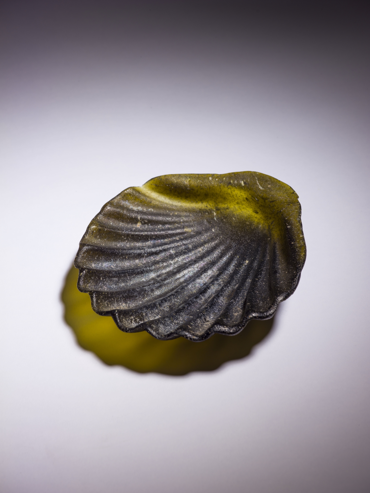Rare Hellenistic Shell-Shaped Glass Vessel Italy or Egypt, 1st century CE (Early Roman period). Photo: Meidad Suchowolski